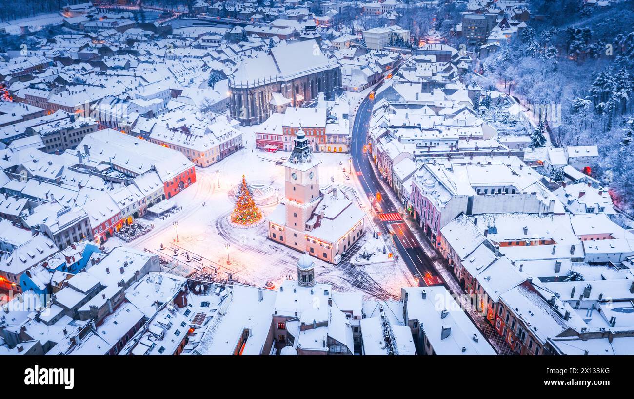 Brasov, Romania. Aerial winter view of Main Square and Christmas Tree, Transylvania landmark. Stock Photo
