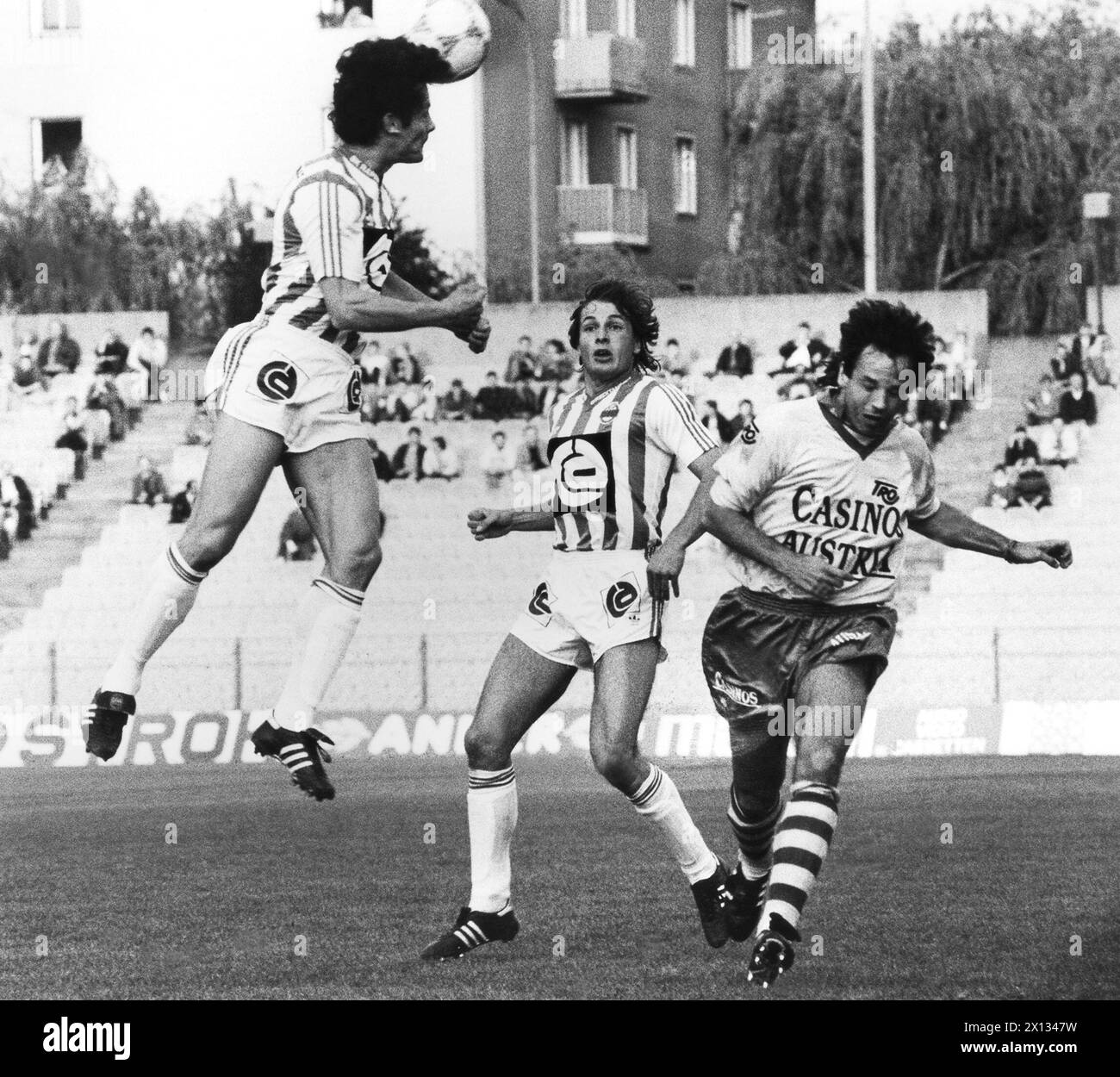 Vienna on May 5th 1989: Master-Play-Off between Rapid and Vienna in Vienna's Hanappi Stadium. In the picture: Weber (header) and Steinkogler (r.) - 19890505 PD0005 - Rechteinfo: Rights Managed (RM) Stock Photo