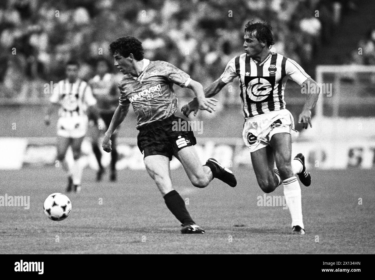 Vienna on July 28th 1989: Match between Rapid and the FCS Tirol in Vienna's Hanappi Stadium. On the picture: Alfred Hoertnagl (l., Tirol) and Robert Pecl. - 19890728 PD0008 - Rechteinfo: Rights Managed (RM) Stock Photo