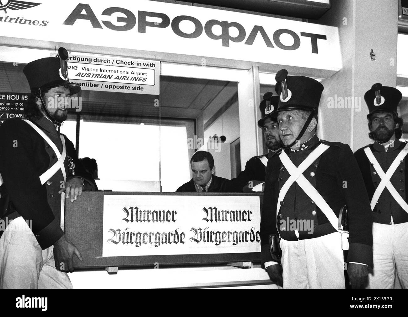 Vienna on March 29th 1990: The guard of Murau, who's roots reach back into the 17th century, asked Soviet president Gorbatschow for munitons supplies for their 'Vorderlanders'. In the East-West confusions, Gorbatschow agreed, and thus a delegation of guards with Napoleonic uniforms went to Moscow to receive the gift. In the picture: Guards at their departure at Vienna's airport. - 19900329 PD0011 - Rechteinfo: Rights Managed (RM) Stock Photo