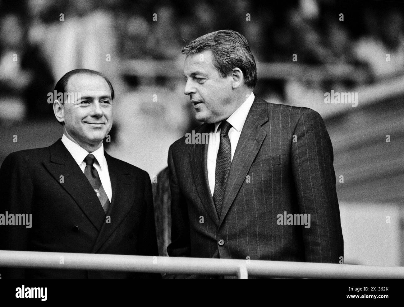 Europe Cup finale in Vienna on May 23rd 1990: Silvio Berlusconi (l.) and Franz Vranitzky (r.) watch the match AC Milan vs Benfica Lissabon. - 19900523 PD0010 - Rechteinfo: Rights Managed (RM) Stock Photo