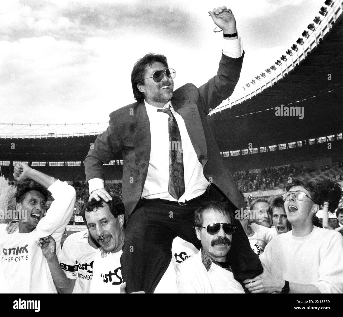 Vienna on May 30th 1991: FC Stockerau won against Rapid (2:1) and gained the OEFB-Cup 1991. In the picture: Trainer Willy Kreuz on the shoulders of his players. - 19910530 PD0004 - Rechteinfo: Rights Managed (RM) Stock Photo
