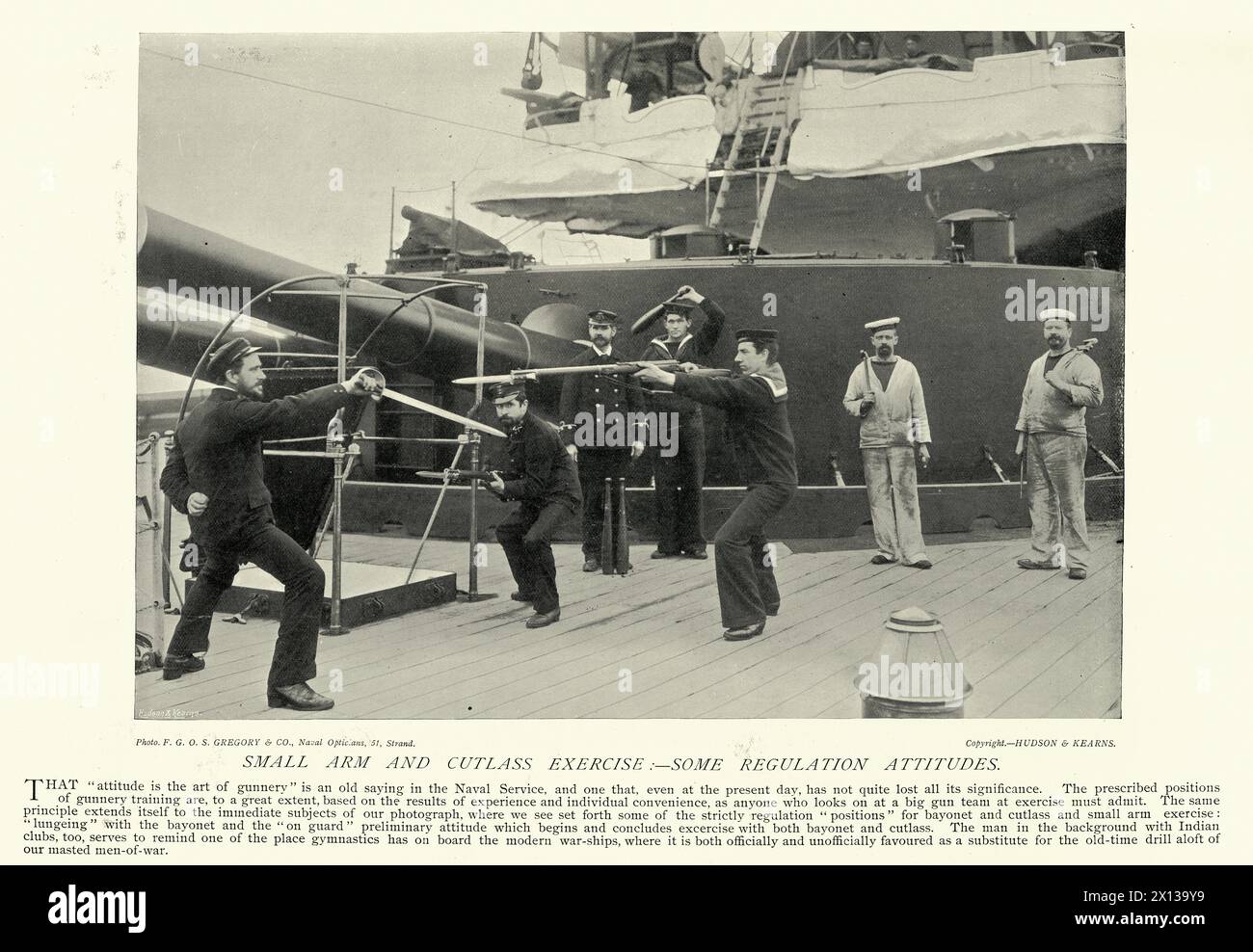 Vintage picture British Royal Navy sailors exercise with cutlass sword and rifle with bayonet on deck of a battleship, Victorian Military History, 1890s 19th Century Stock Photo