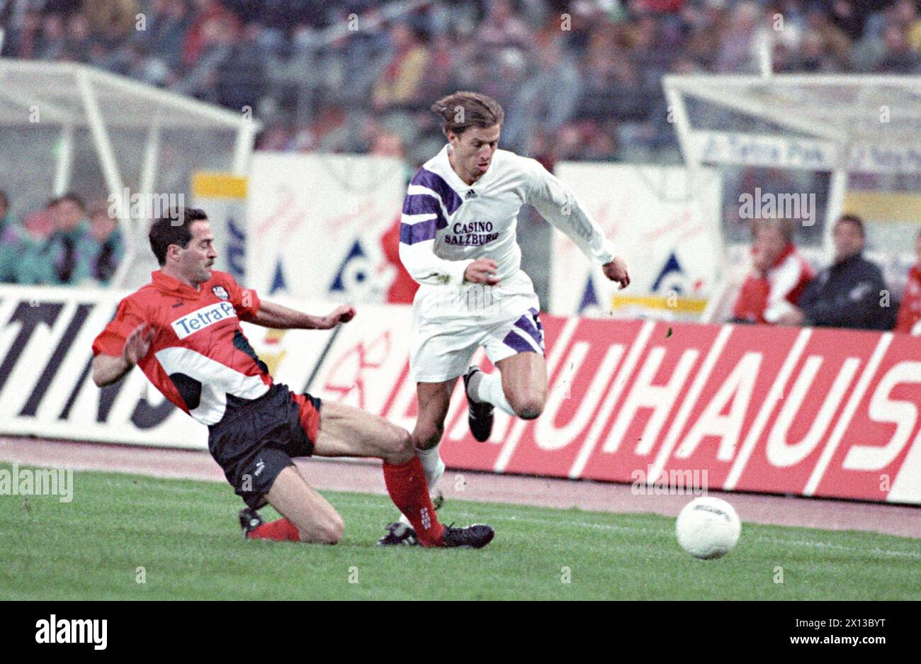 Frankfurt on March 15th 1994: Match between Frankfurt and SV Salzburg (4:5)  in the context of the UEFA Cup 1994. In the picture: Wolfgang Feiersinger (SV Salzburg, r.) and Uwe Bein (Frankfurt, l.) - 19940315 PD0011 - Rechteinfo: Rights Managed (RM) Stock Photo