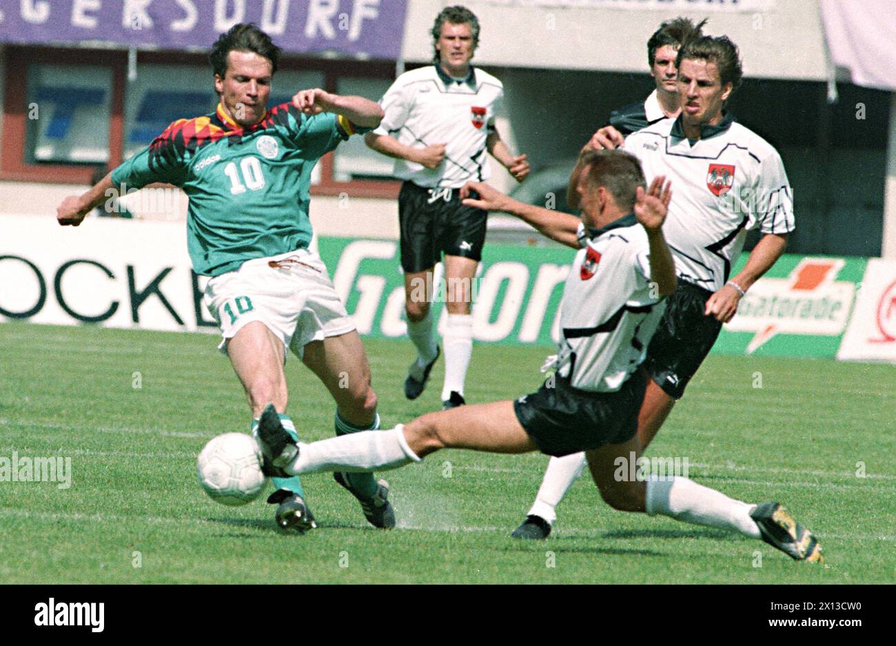 A friendly soccer match between Austria and Germany in Vienna on June 2nd 1994. Picture: German Lothar Matthaeus (l.), Austrian Toni Polster (back) and Wolfgang Feiersinger (r.). - 19940602 PD0016 - Rechteinfo: Rights Managed (RM) Stock Photo