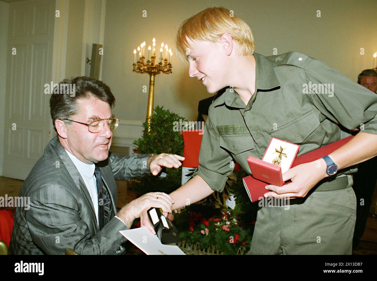 Vienna on June 27th 1994: Austria's Olympic Heros of Lillehammer (Norway) are awarded in the Federal Chancellery with the Badge of Honour. (l-r): Heinz Fischer (first president of parliament) and ski jumper Andreas Goldberger. - 19940627 PD0012 - Rechteinfo: Rights Managed (RM) Stock Photo