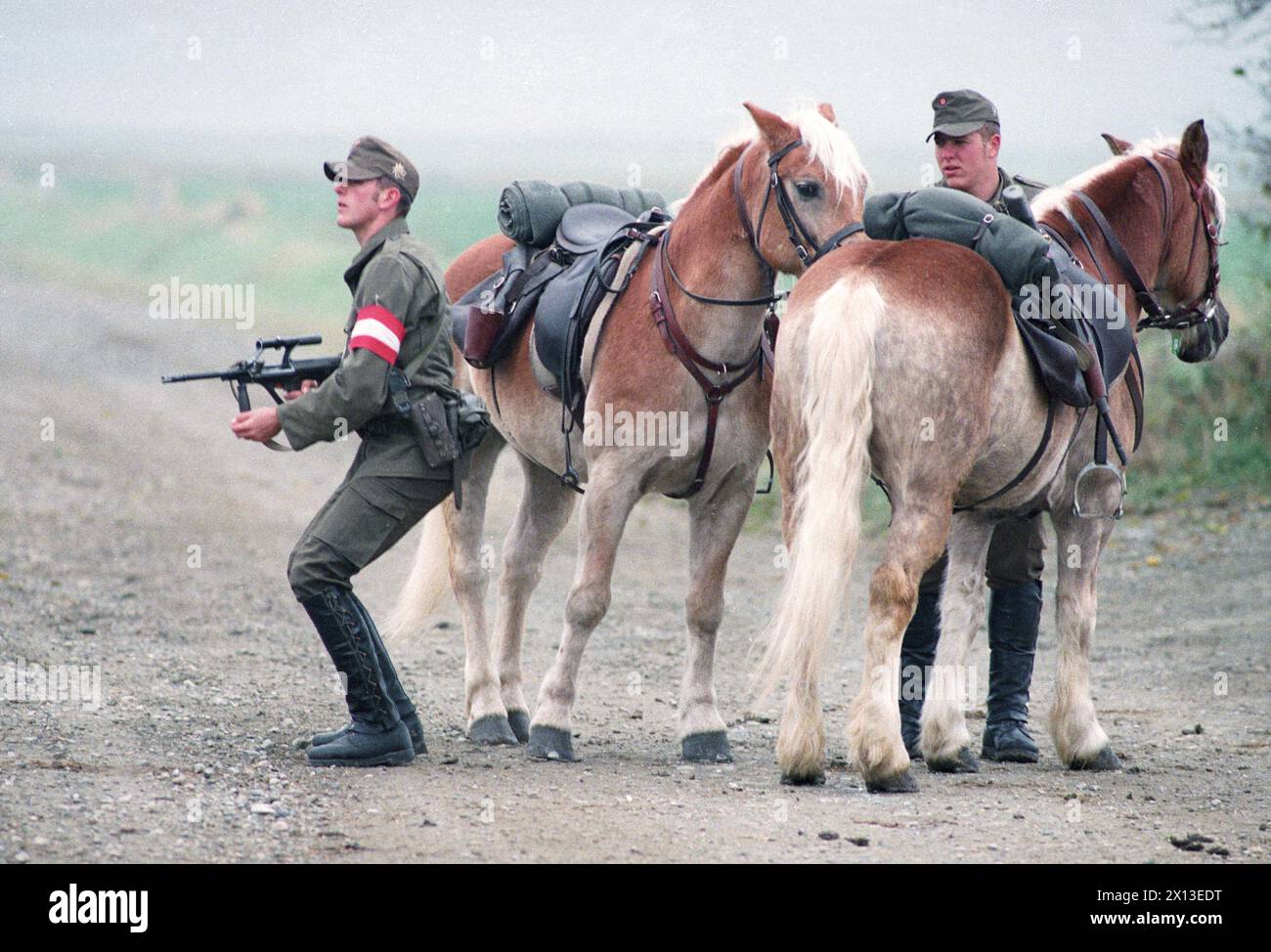 Rechnitz, Austria, on November 8th 1994: Soldiers with horses at the border between Austria and Hungary. - 19941108 PD0009 - Rechteinfo: Rights Managed (RM) Stock Photo