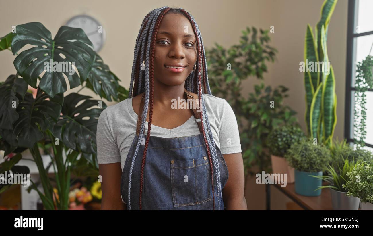 Woman beautiful braids stands hi-res stock photography and images - Alamy