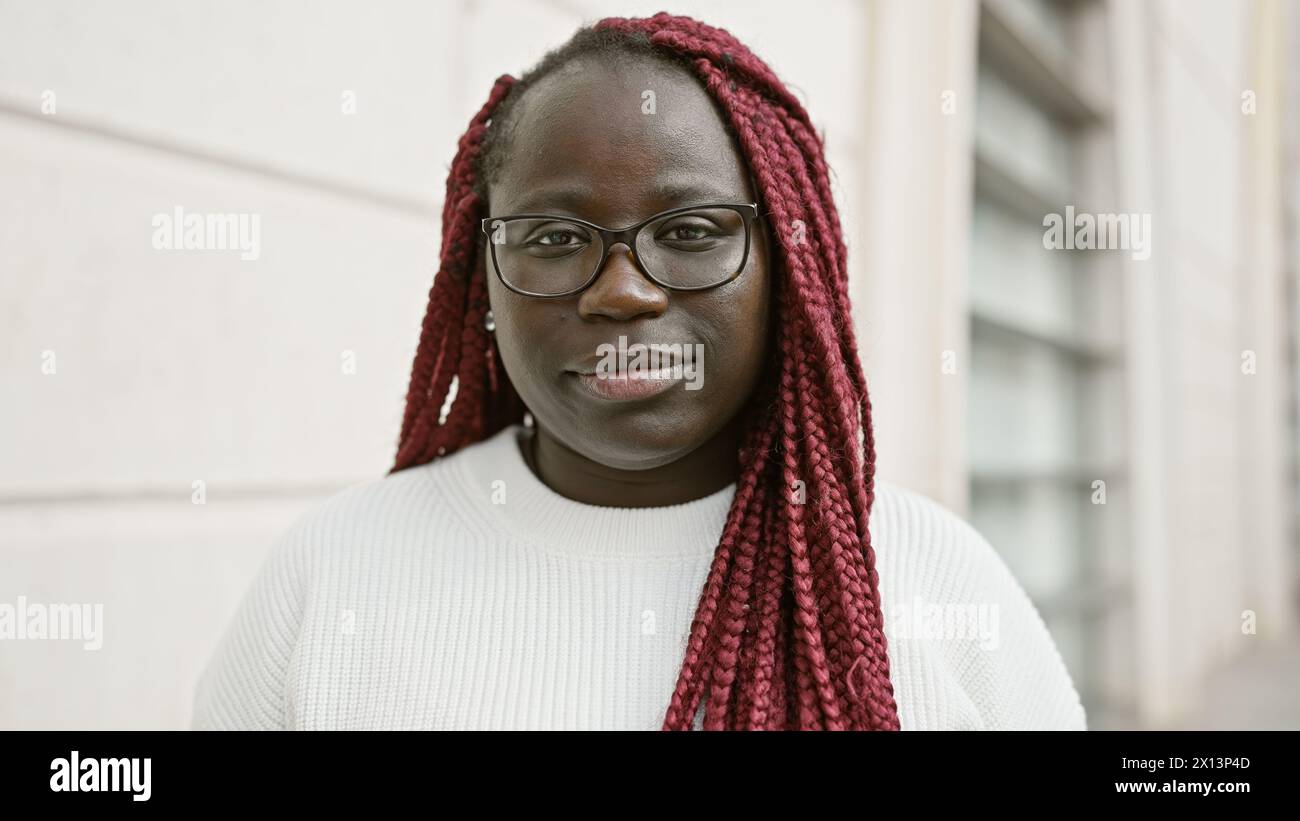 Woman wearing glasses braids hi-res stock photography and images - Alamy