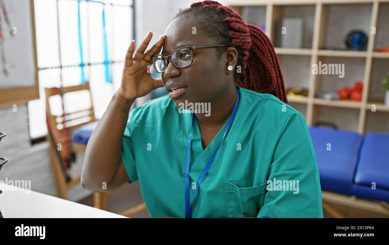 Focused black woman braids wearing hi-res stock photography and images ...