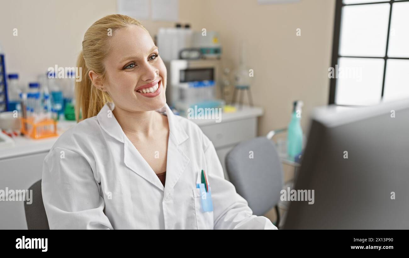 Woman scientist smiling in white hi-res stock photography and images ...