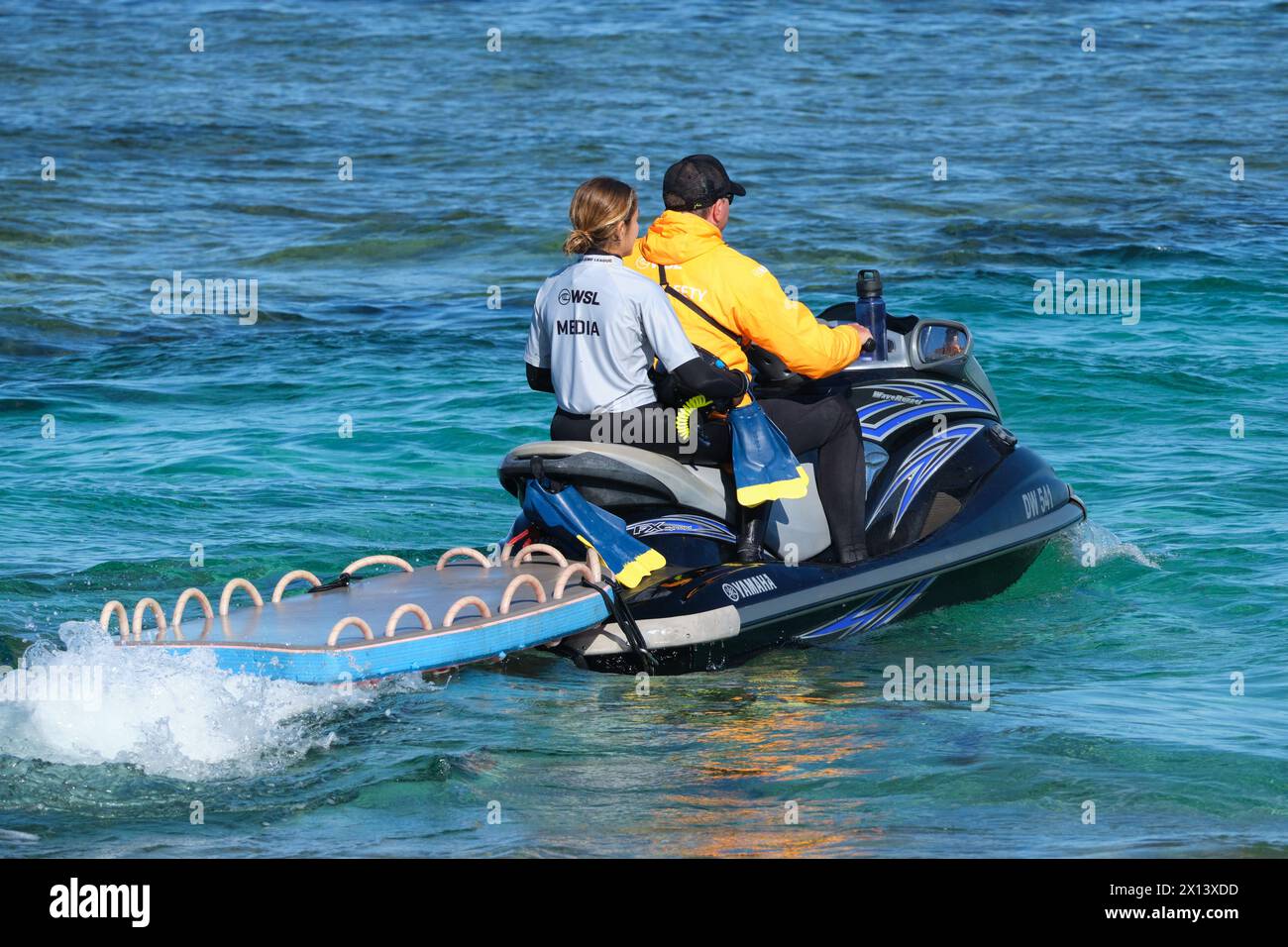 World Surf League media jet ski with photographer on board holding