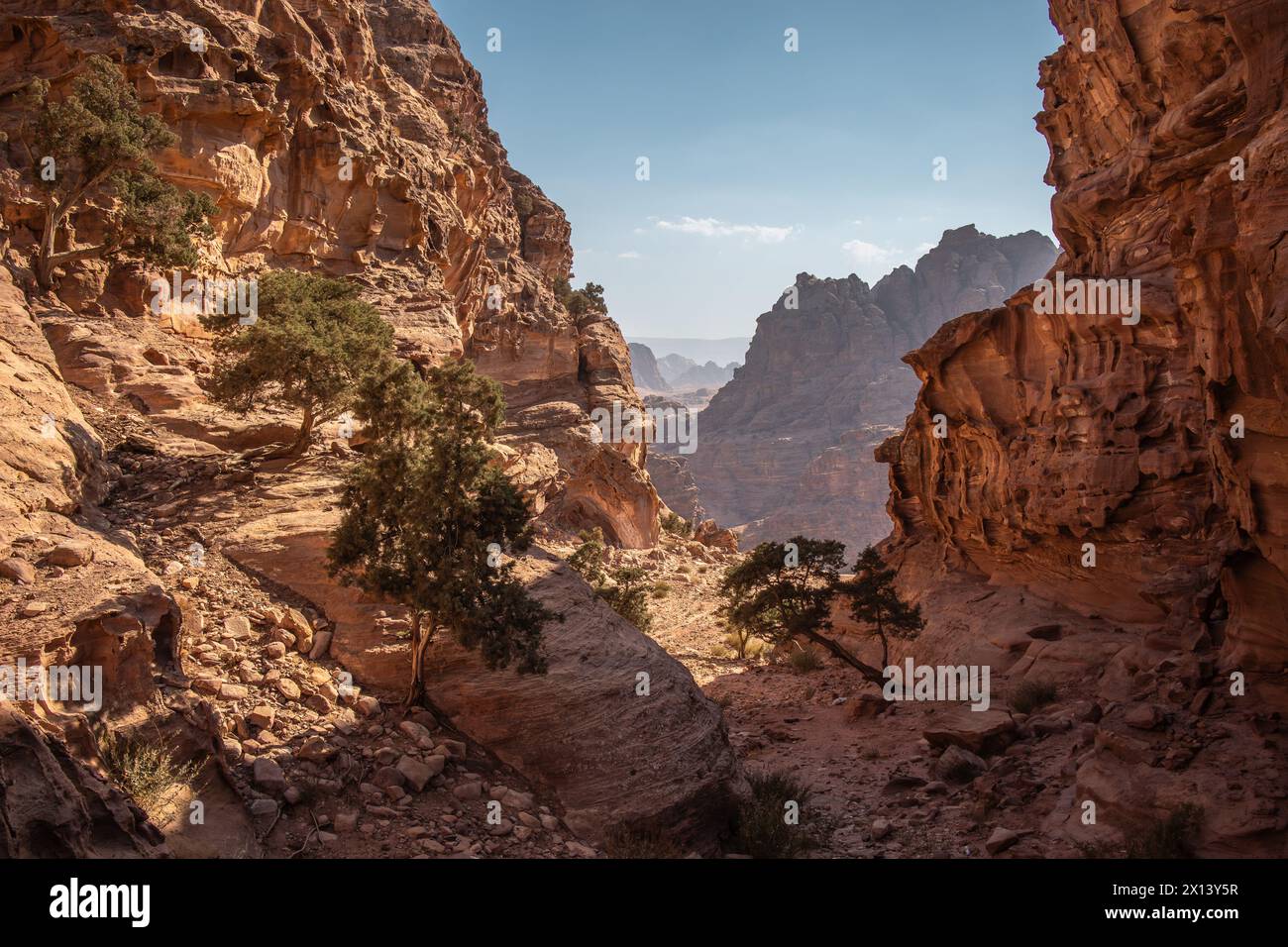 View of Rocky Sandstone Canyon in Jordanian Petra. Middle East Scenery of Outdoor Landscape. Spectacular Stony Cliffs in Jordan. Stock Photo