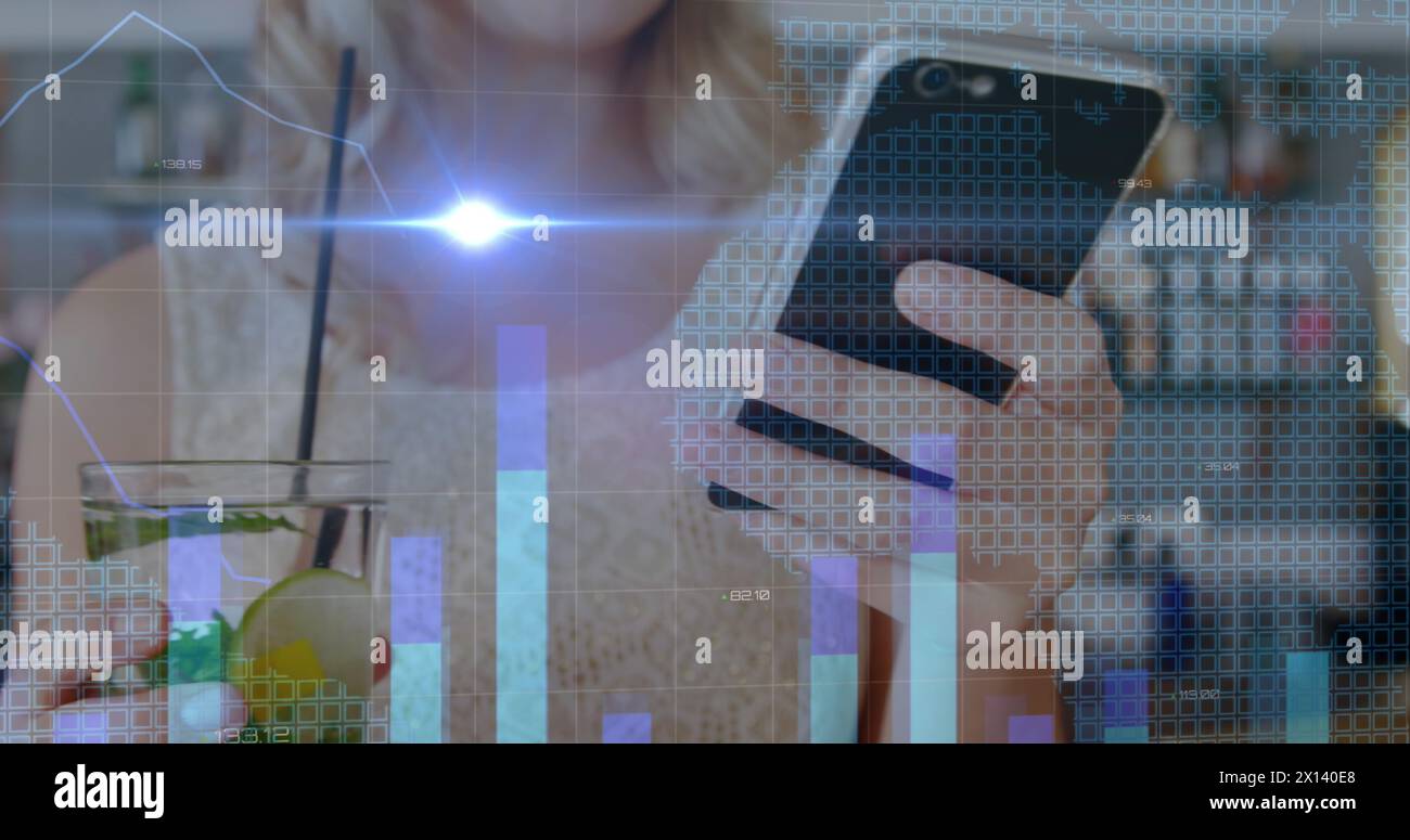 Image of light and graphs over midsection of caucasian woman using smartphone Stock Photo