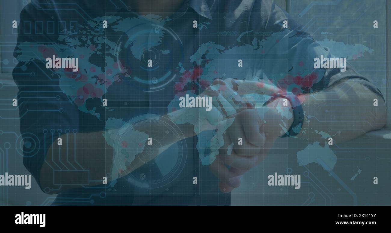 Image of data processing on screens over caucasian man checking smartwatch Stock Photo