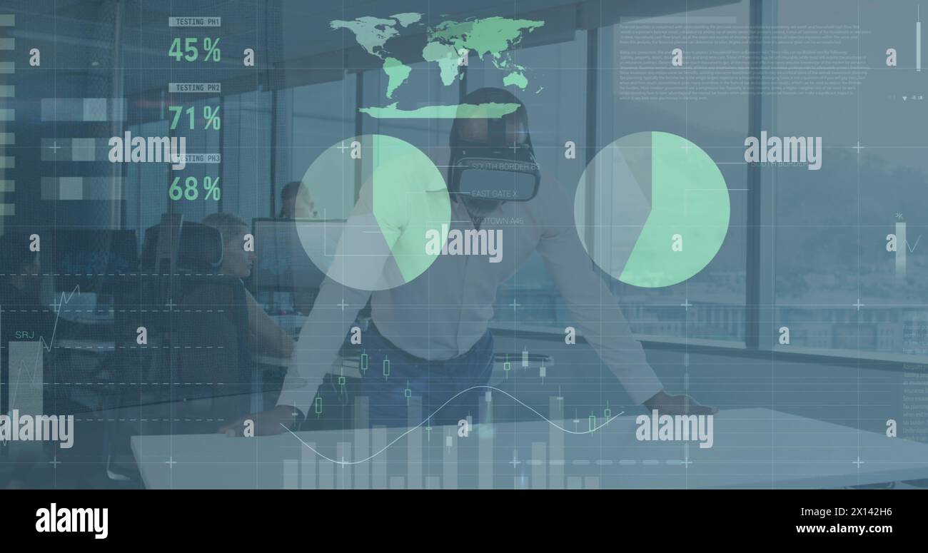 Image of data processing over caucasian businessman using vr headset at office Stock Photo