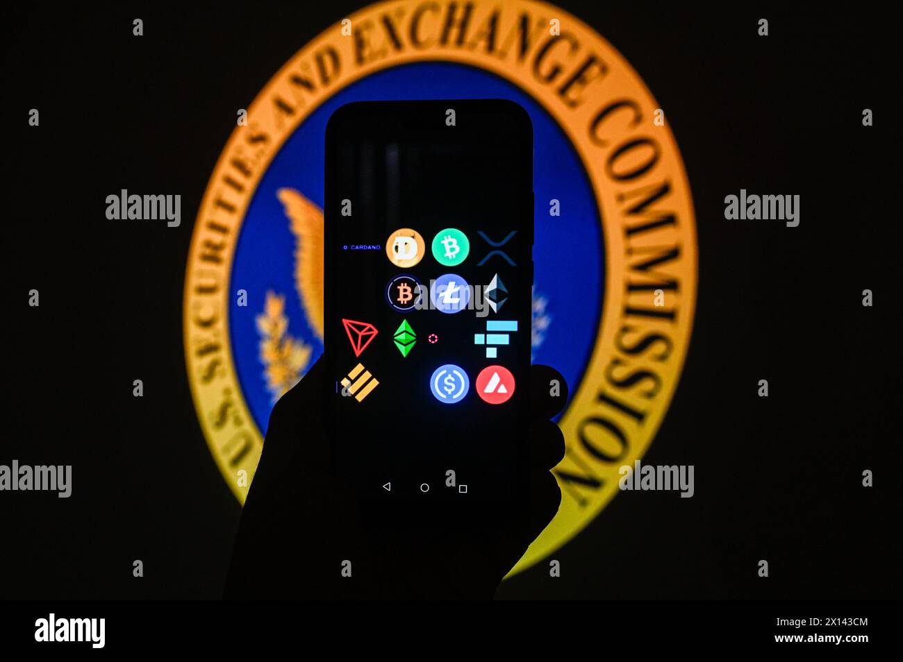 Poland. 15th Apr, 2024. In this photo illustration, cryptocurrencies logos are displayed on a smartphone with a SEC logo on the background. Credit: SOPA Images Limited/Alamy Live News Stock Photo