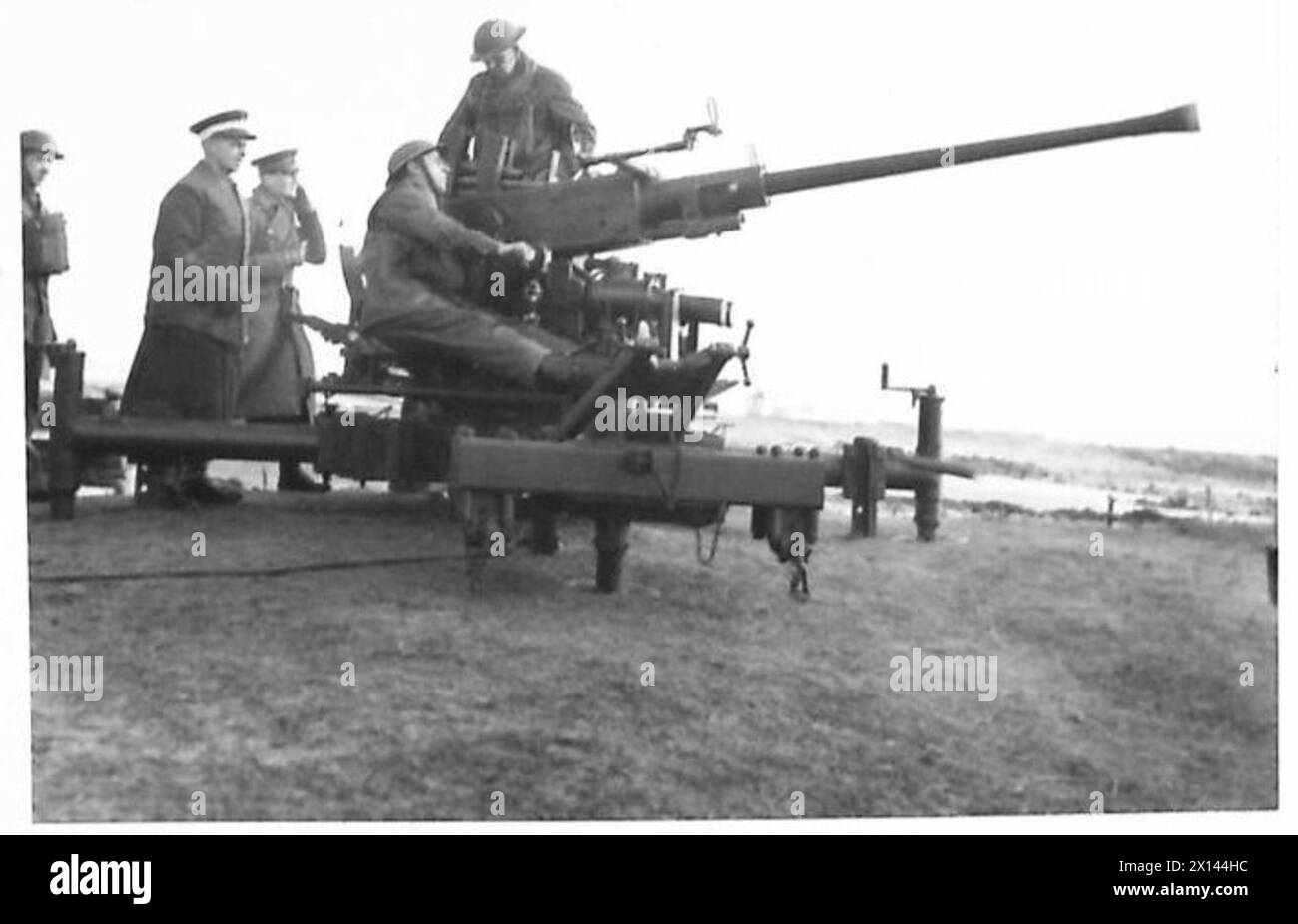 A.A. TRAINING - "Sighting the target". Gunners manning the Bofors AA