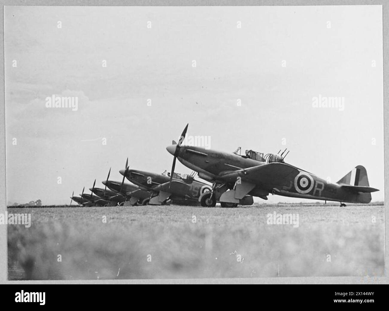 THE BATTLE OF BRITAIN 1940 - Boulton Paul Defiants of No. 264 Squadron, Kirton in Lindsey, Lincolnshire, August 1940. N1536 PS-R nearest Royal Air Force Stock Photo