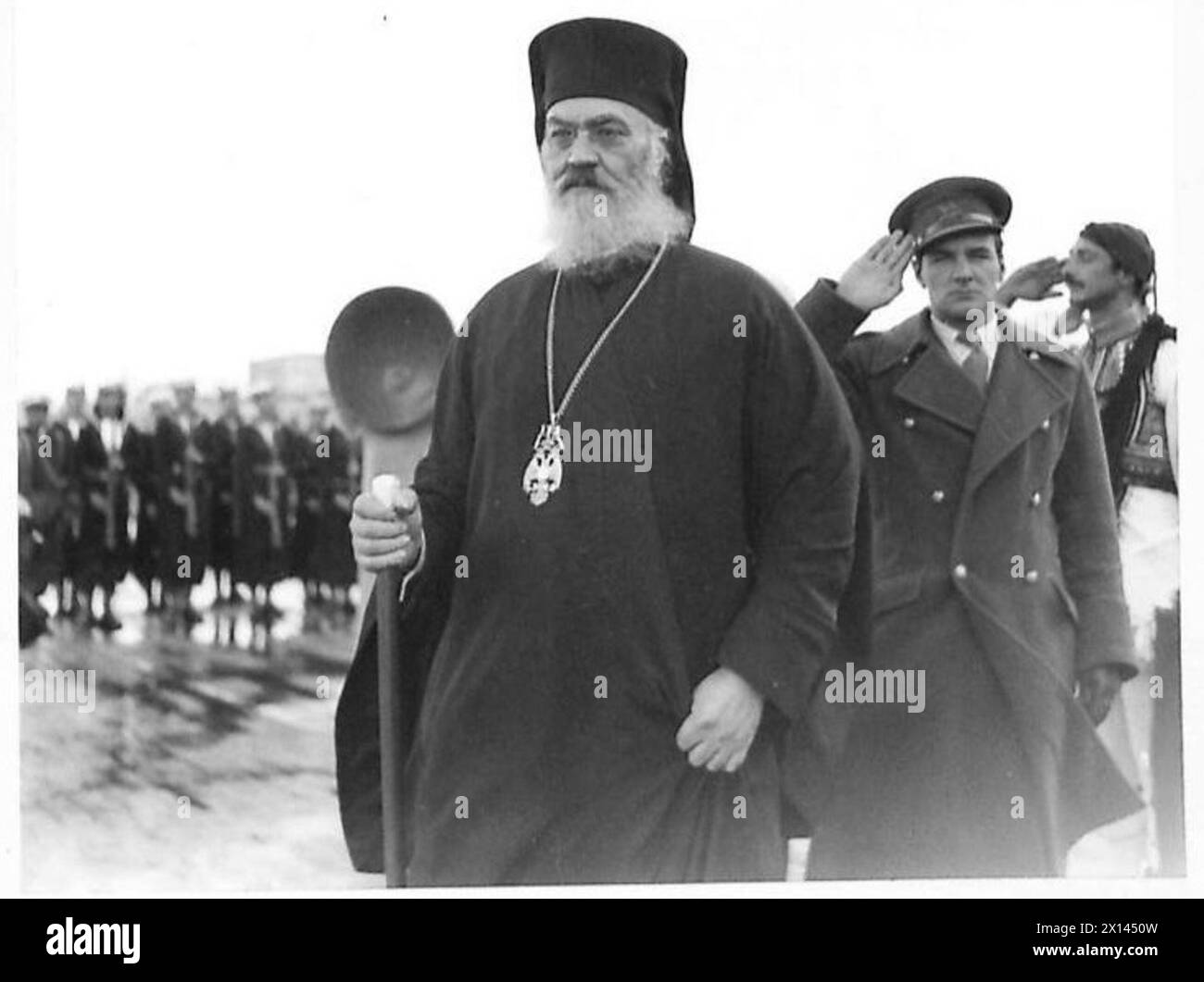 REGENT OF GREECE REVIEWS GREEK FLEET - The Archbishop halts while the Greek National Anthem is played British Army Stock Photo