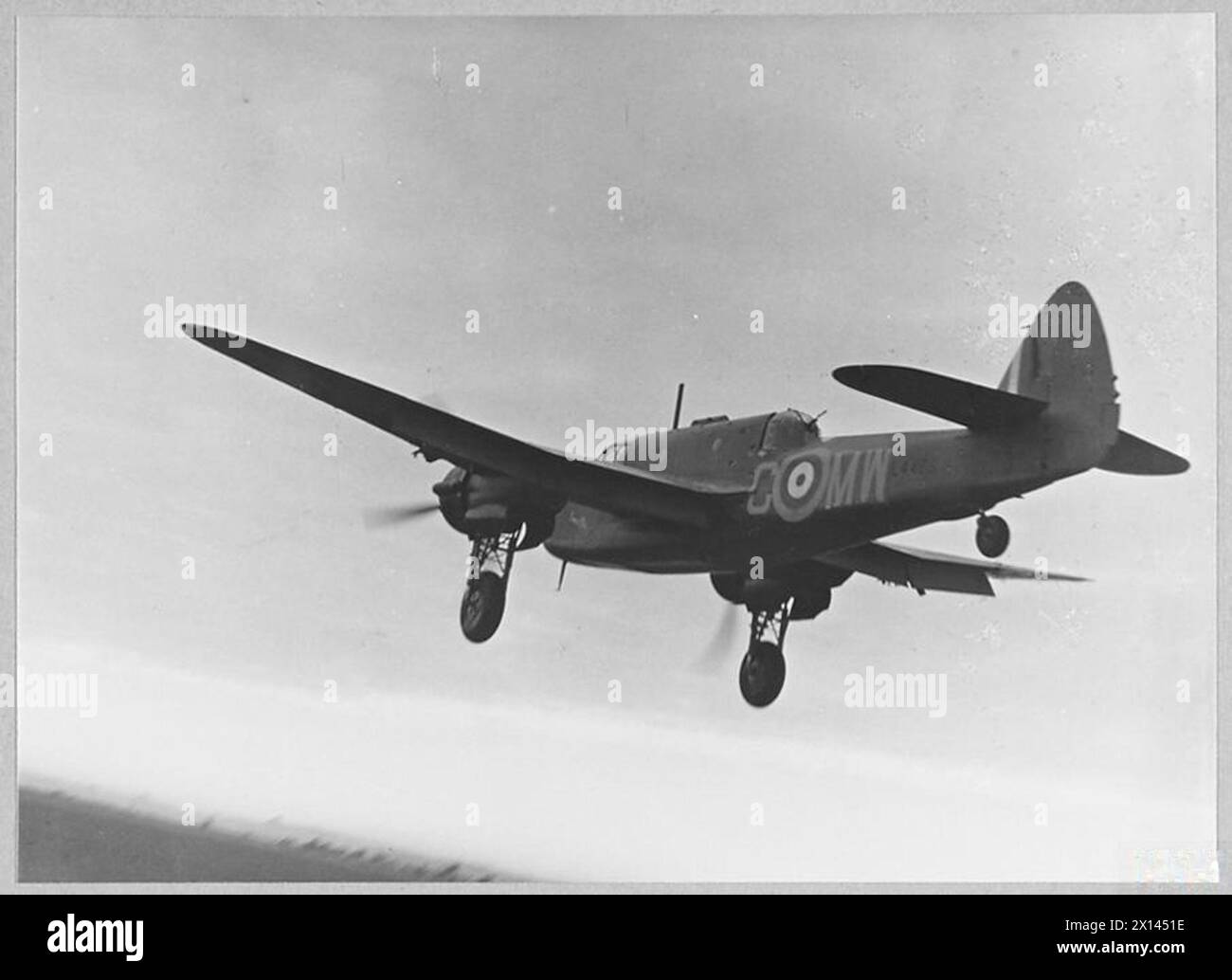 BEAUFORT SQUADRON - [1595] With undercarriages and wing flaps down Beauforts come in to land Royal Air Force Stock Photo