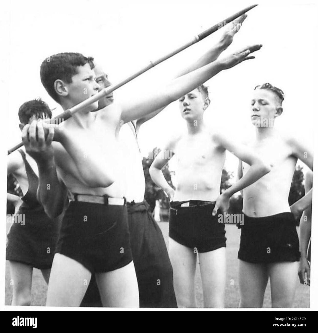 ARMY CADET FORCE CAMP Our lad is seen being shown the correct way to