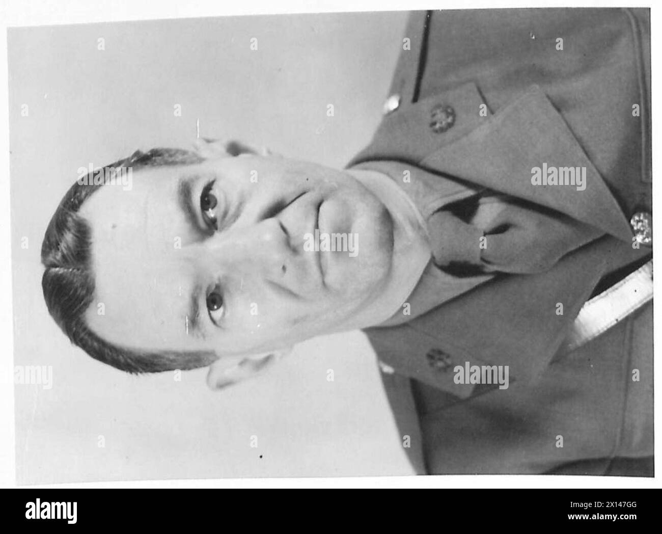 Major Macdonald is pictured as the Director of the Army Film Unit in ...