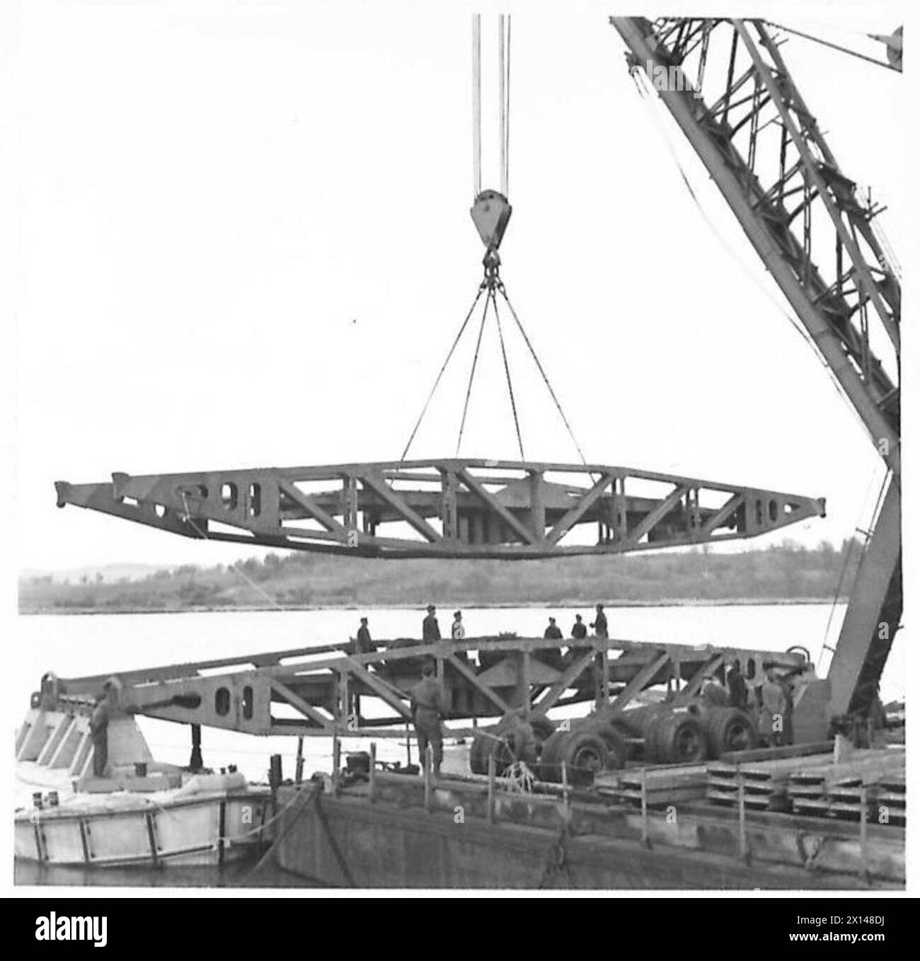 SPECIAL ASSIGNMENT FOR DTN Swinging a flexible bridge span into position for lowering on to F