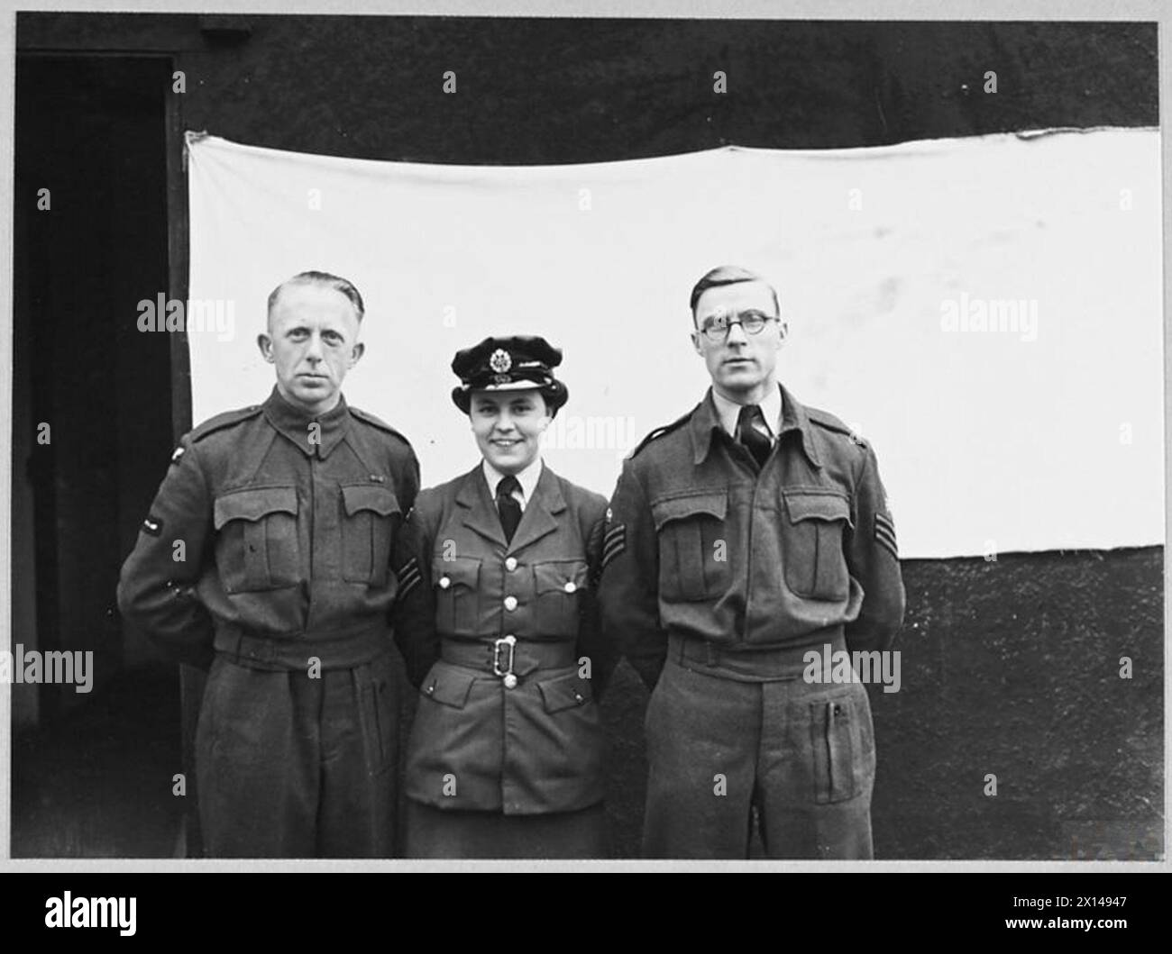 AIR CHIEFS STAFF - 20th December 1945 - - Left to right - Sergeant Kay Staughton, W.A.A.F., and Flight Sergeant Cyril Jolly Royal Air Force Stock Photo