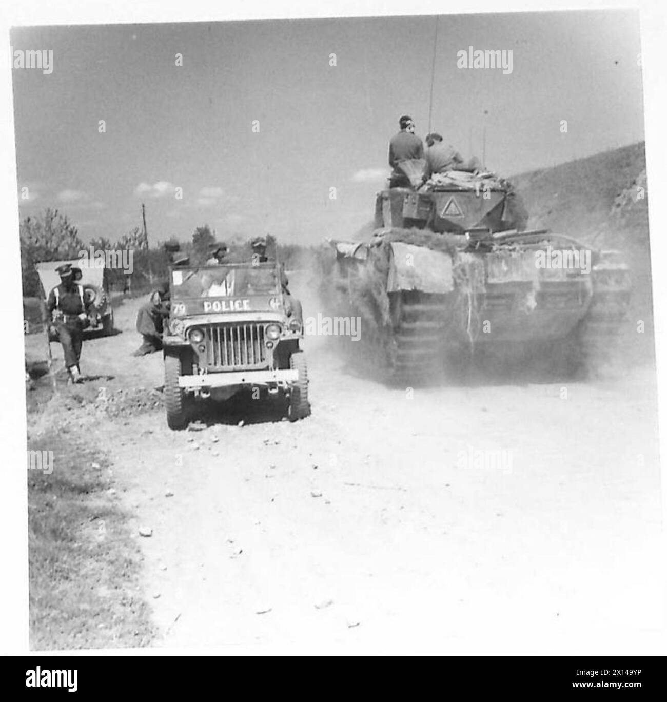 Eighth Army Inprocessing During combat over the Santerno, a prisoner is recovered by a CMP jeep ...