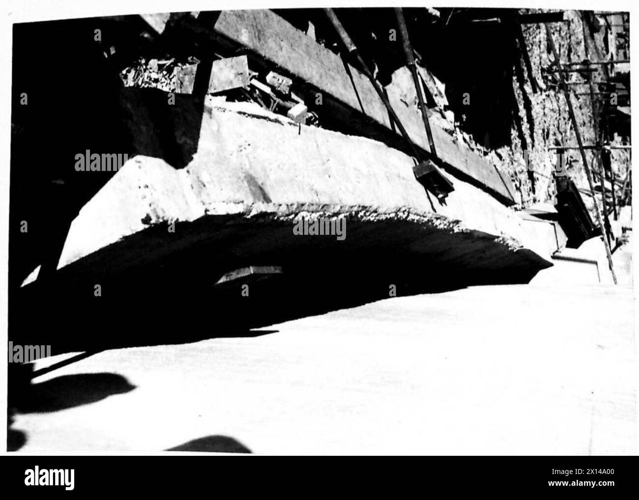 Photographs record damage to runners, slipway, and a Hippo vehicle during preparations for launch at Gosport under a special assignment for Tn.5. Stock Photo