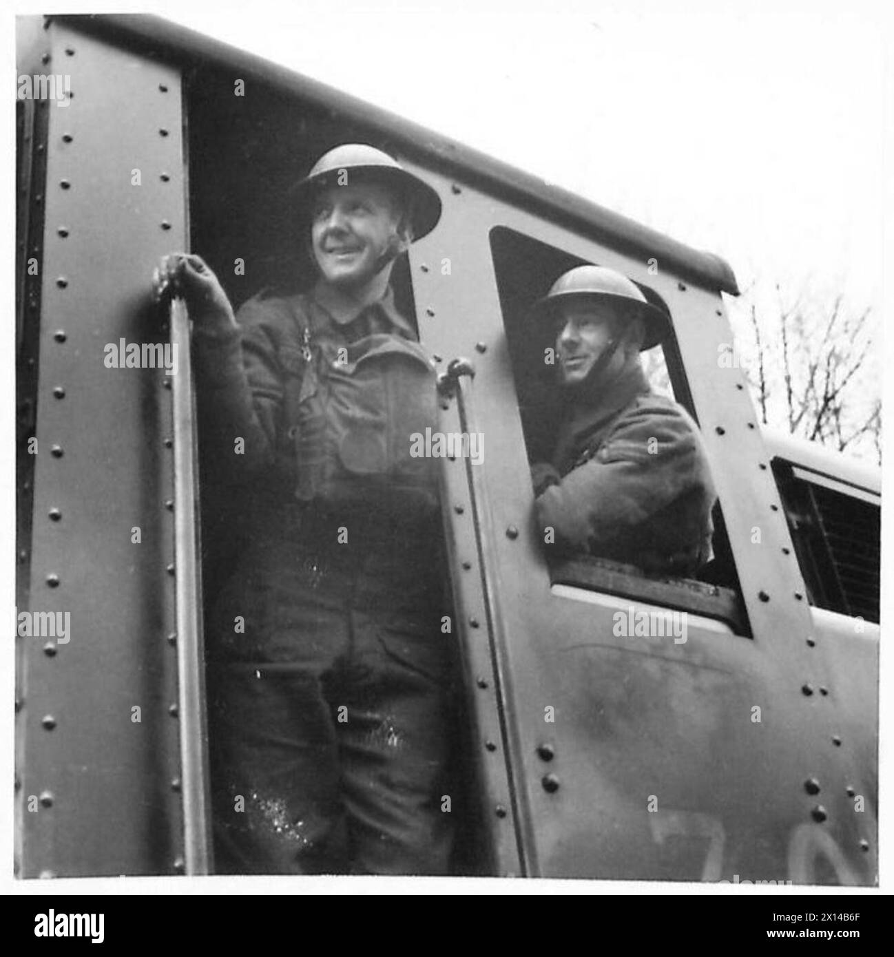 Train drivers operate a large-caliber railway-mounted gun, a ...