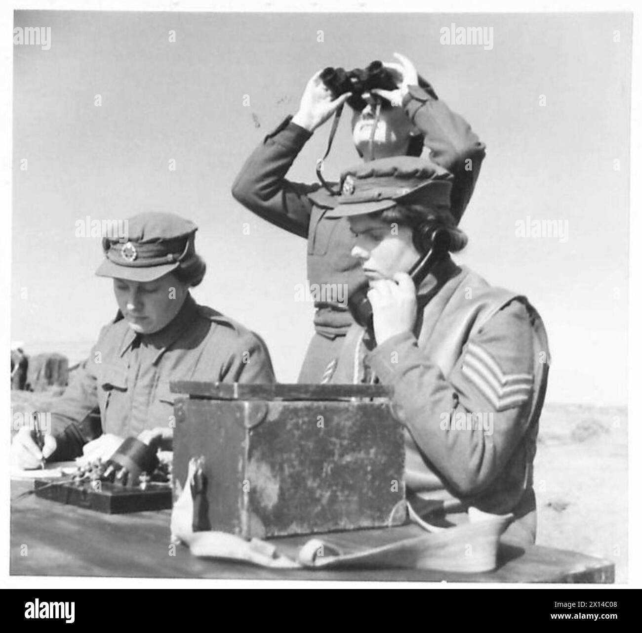 ATS Kinetheodolite operators monitor anti-aircraft gunnery practice ...