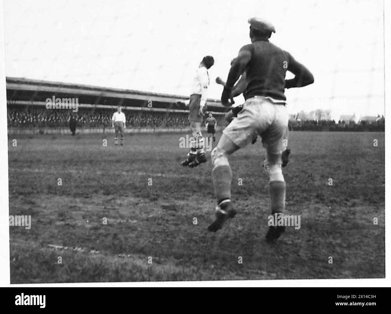 THE POLISH ARMY IN BRITAIN, 1940-1947 - Play around the Polish goal during a football game between teams representing Polish and Belgian armies. Photograph taken at Forfar. A special series of photographs dealing with the domestic and social life of troops of the 1st Polish Corps in Scotland where the officers and men are firmly established favourites with the local people. Some of the young soldiers were attending universities in Poland when war broke out. On arrival in Britain they joined the Polish Forces and continued their studies at the St Andrews University in order to finish their degr Stock Photo