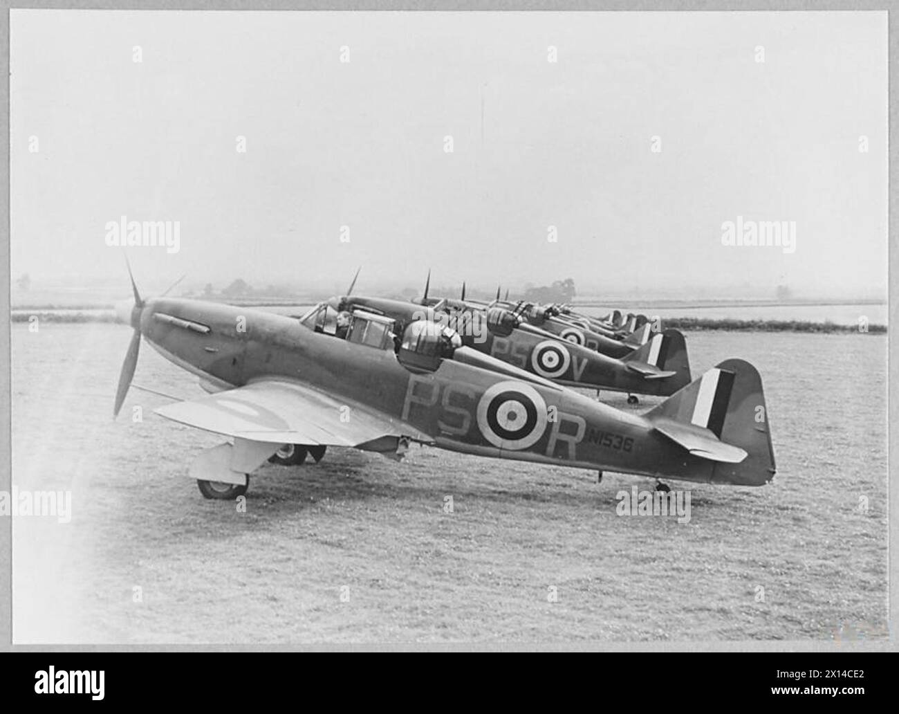 THE BATTLE OF BRITAIN 1940 - Boulton Paul Defiants of No. 264 Squadron, Kirton in Lindsey, Lincolnshire, August 1940. N1536 PS-R nearest, with L7026 PS-V and L6967 PS-P behind Royal Air Force Stock Photo