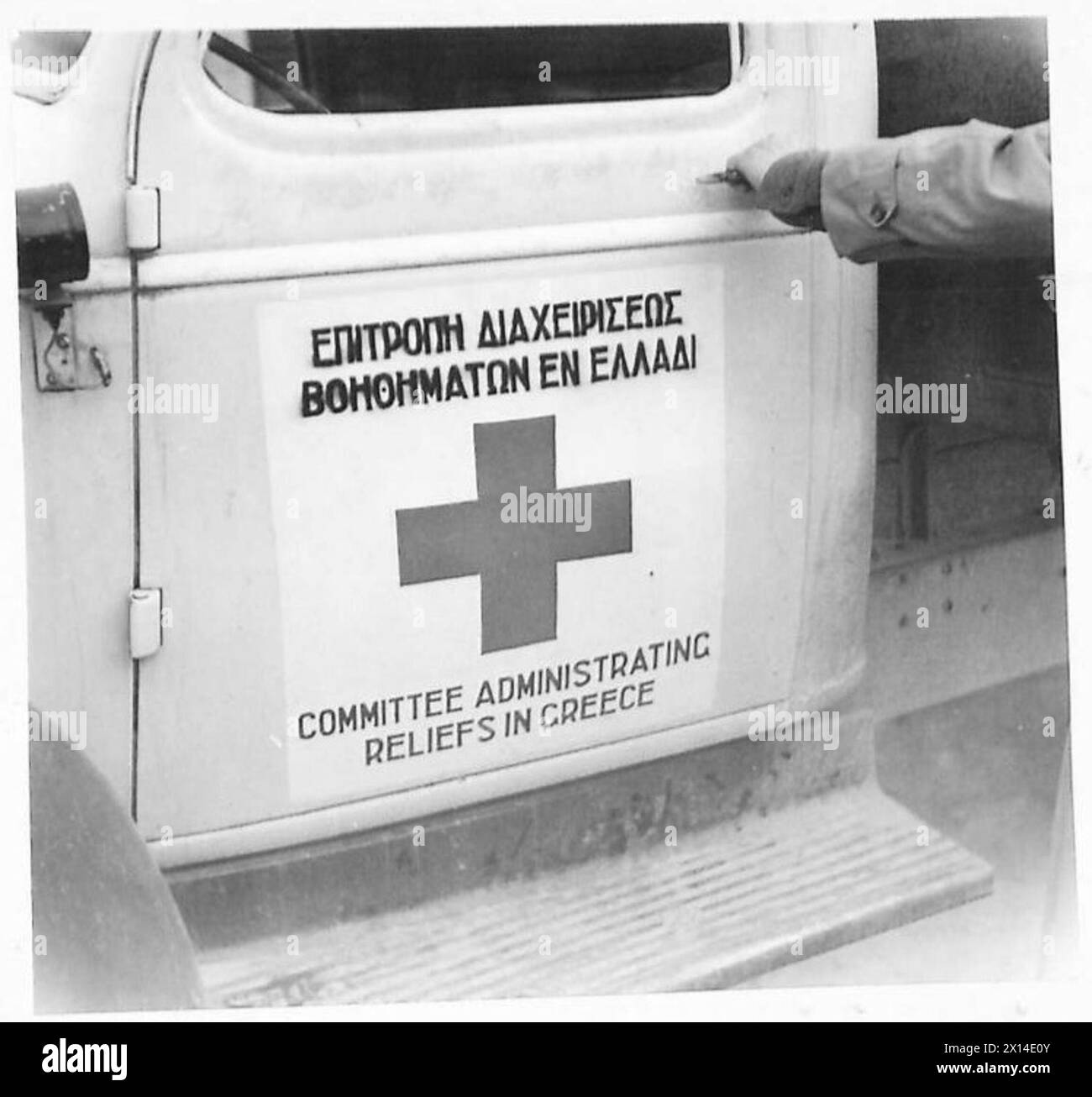 U.N.R.R.A. AT WORK IN GREECE - The sign which is painted on the doors of all trucks operating with the Joint Relief Committee - clearly marked in two languages British Army Stock Photo