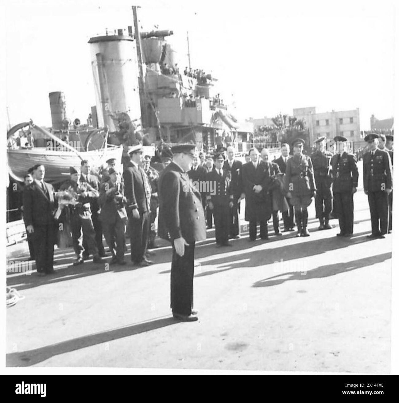 PRIME MINISTER IN ICELAND - The Prime Minister at Reykjavik. In the background are Ensign Franklyn D. Roosevelt jnr., Hermann Ronasson, Prime Minister of Iceland, General Sir John Dill (CIGS) and Air Chief Marshal Sir Wilfred Freeman (VCAS) British Army Stock Photo