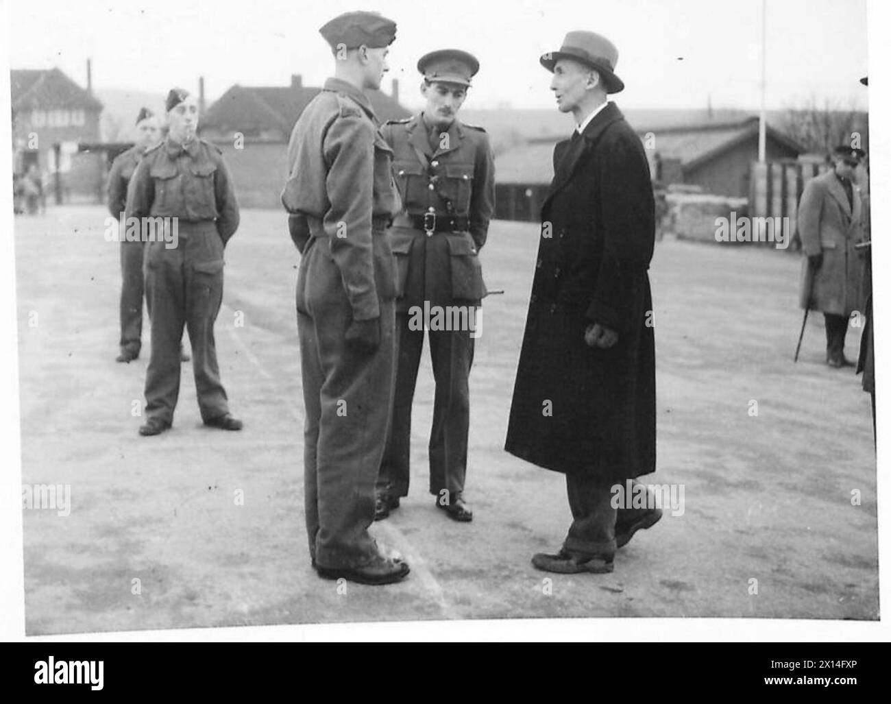 MR. OGILVIE WANTS TO KNOW Mr. Ogilvie chatting to a recruit on a