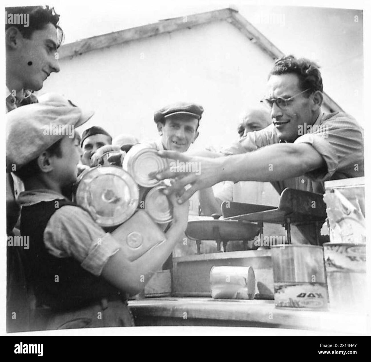 Soldiers at the Eighth Army front during the invasion of Italy receive ...