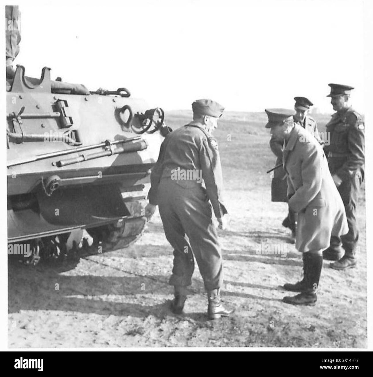 His Majesty the King and Lieutenant General N.M. Ritchie inspect a 3 ...