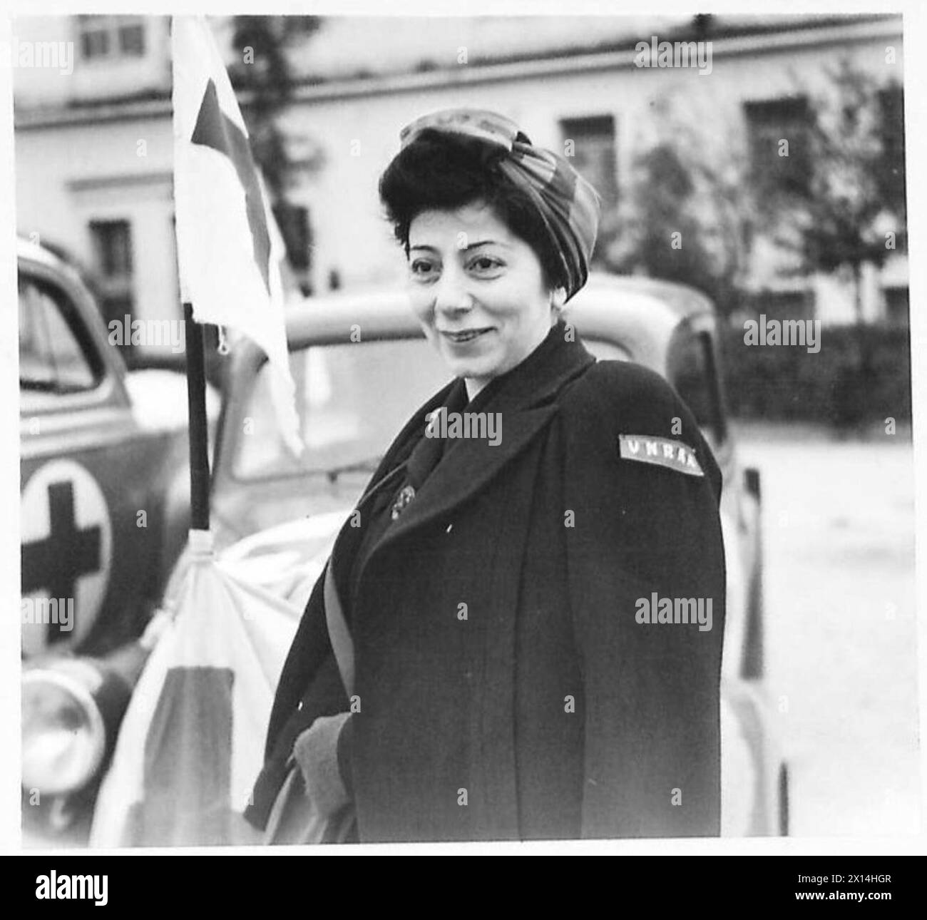 U.N.R.R.A. AT WORK IN GREECE - Lucille Vassaardaki of 3675 Broadway, New York City, normally of the Public Relations Division, now assisting in the loading and despatch of trucks loaded with supplies for various hospitals and food centres British Army Stock Photo