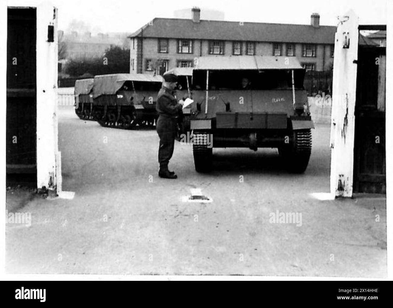 Loyd Mark II carriers are checked in at the depot entrance as part of a special assignment for W.S.7[c] during British Army operations. Stock Photo