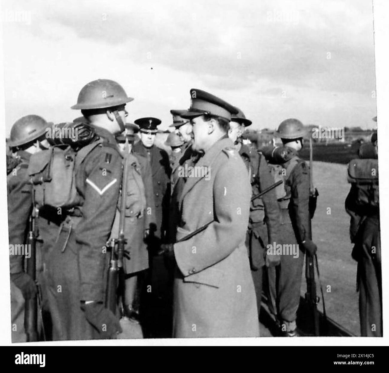The Commander-in-Chief inspects troops assigned to aerodrome defense ...