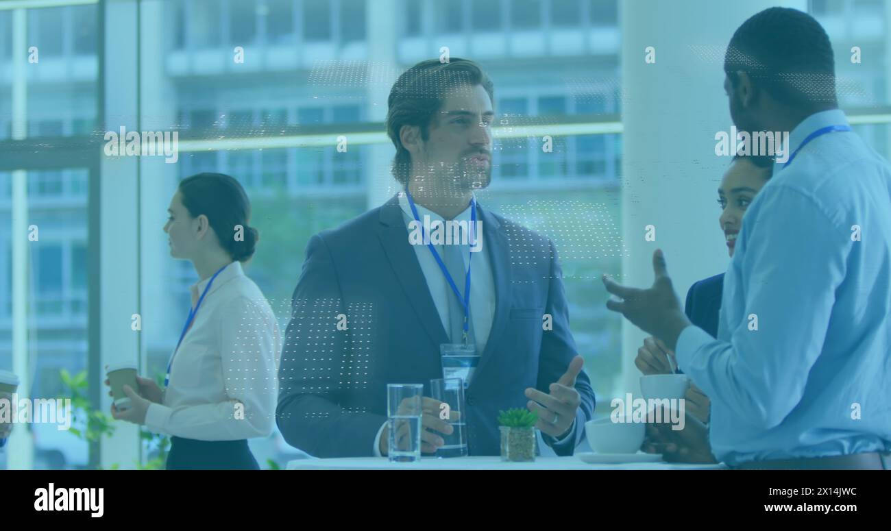 Image of binary coding data processing over diverse businesspeople discussing at office Stock Photo