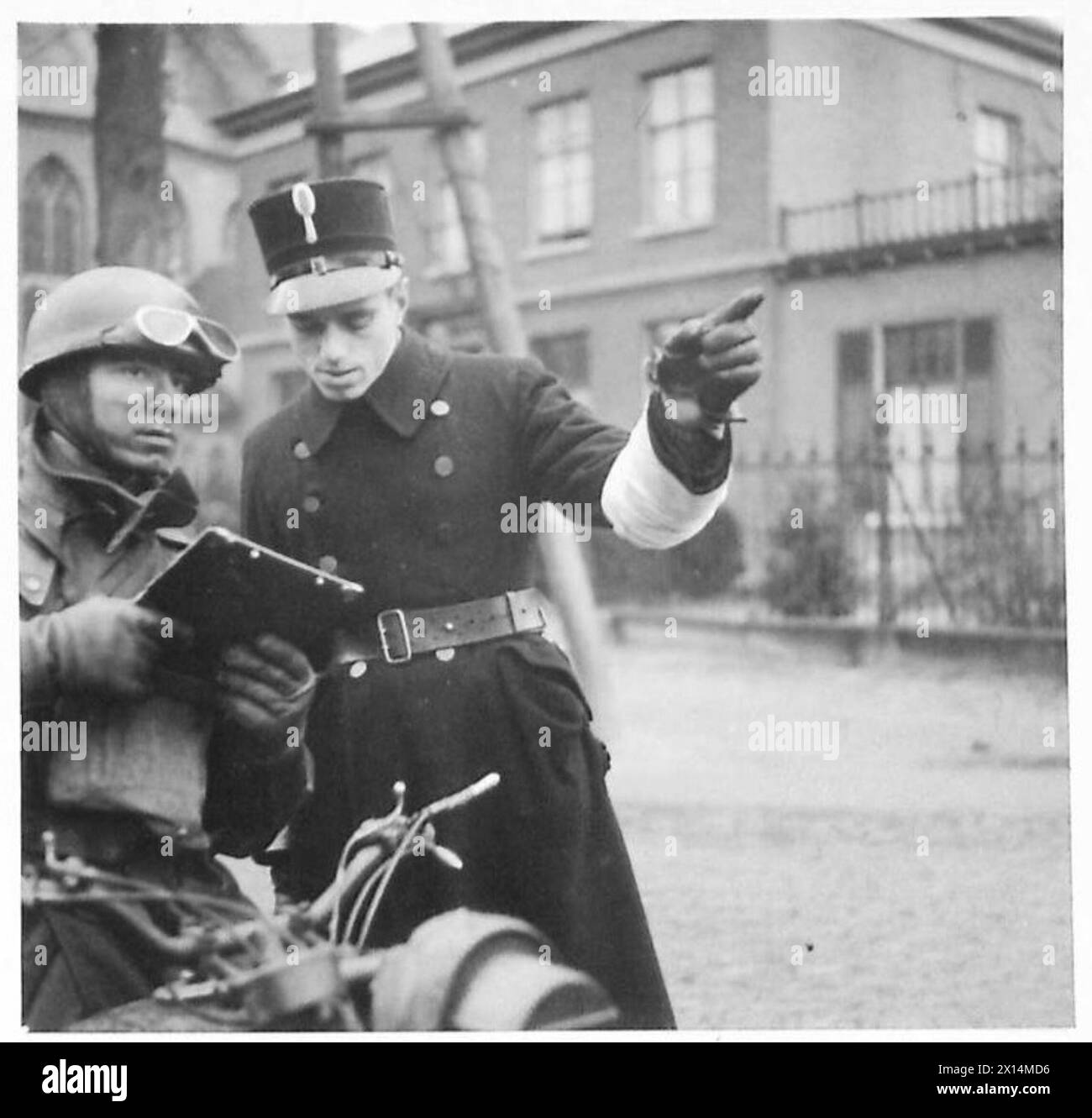 A British dispatch rider travels through Holland, receiving directions ...