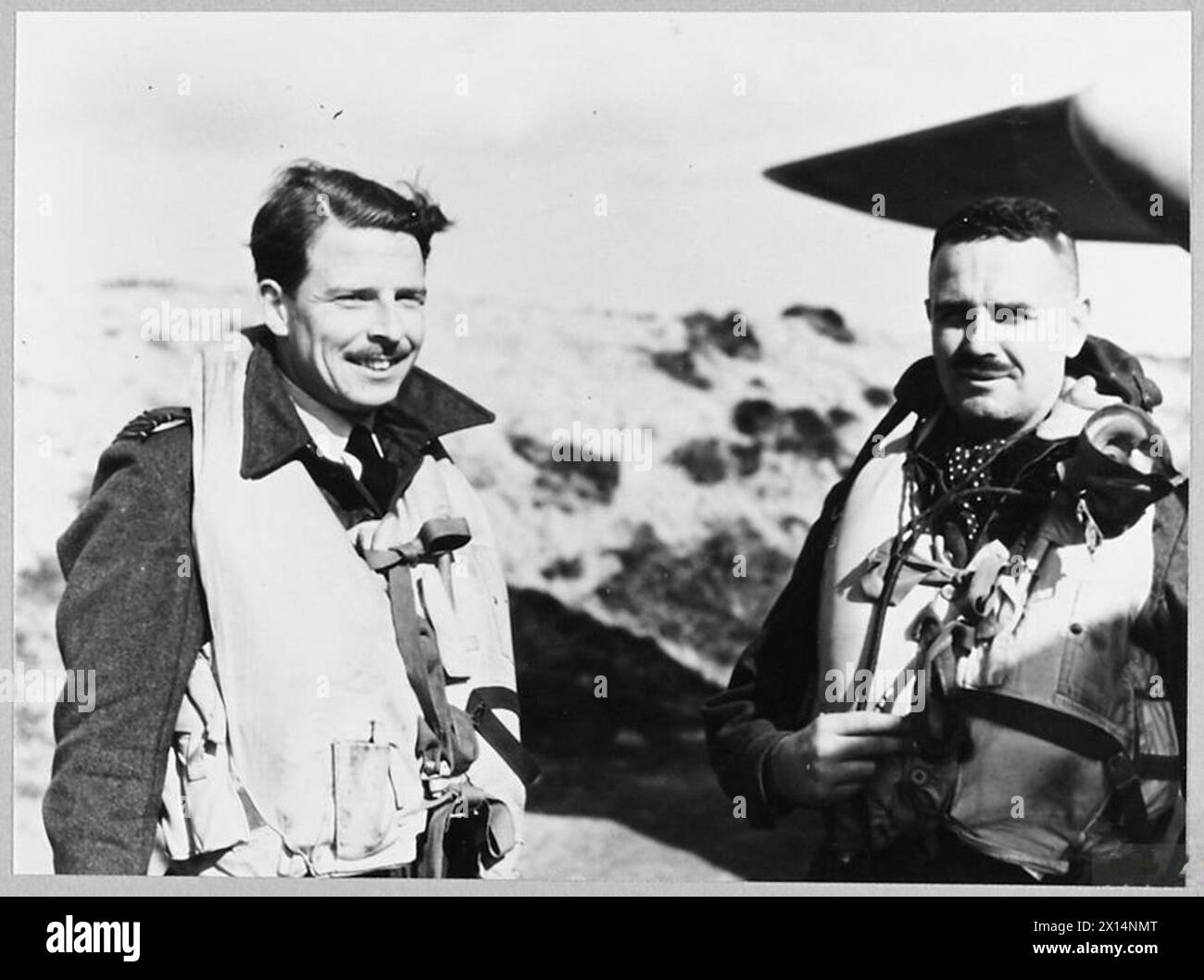Wing Commander G.H. Goodman, DFC, and Flying Officer W.F.E. Thomas ...