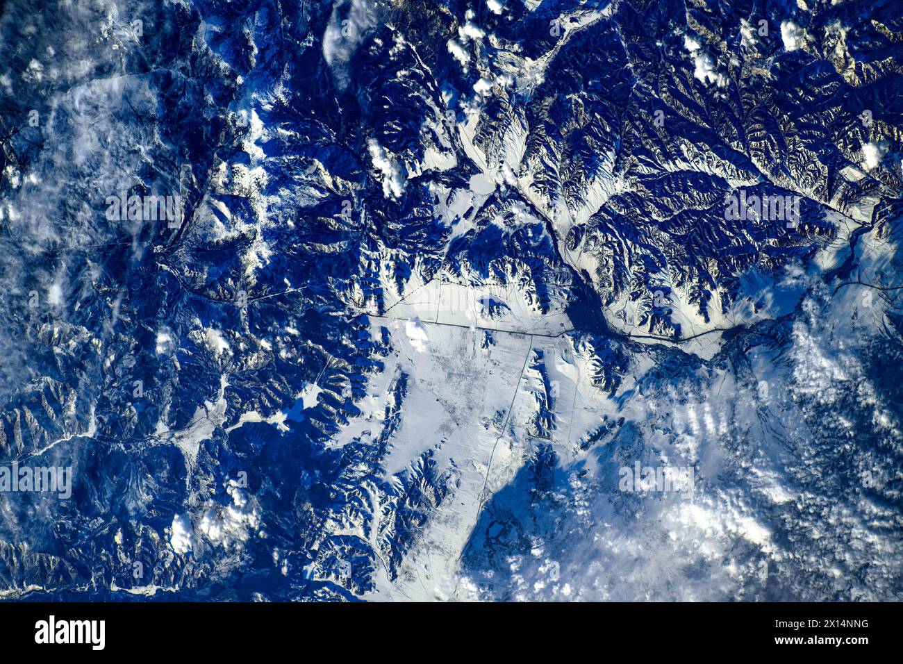 Frozen land features in Mongolia's northern border with Russia. Digital enhancement of an image by NASA Stock Photo