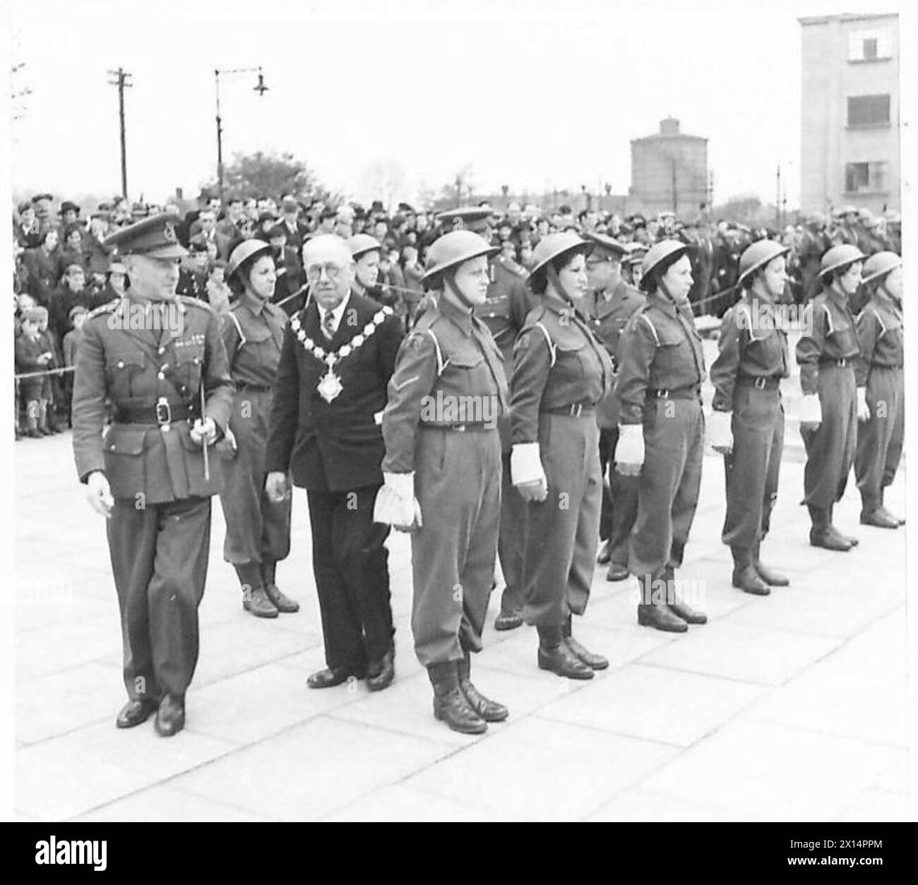 'SALUTE THE SOLDIER' WEEK AT ERITH - General Sir F.A. Pile and the Mayor of Erith inspecting the A.T.S.personnel who gave a demonstration after the the opening ceremony British Army Stock Photo