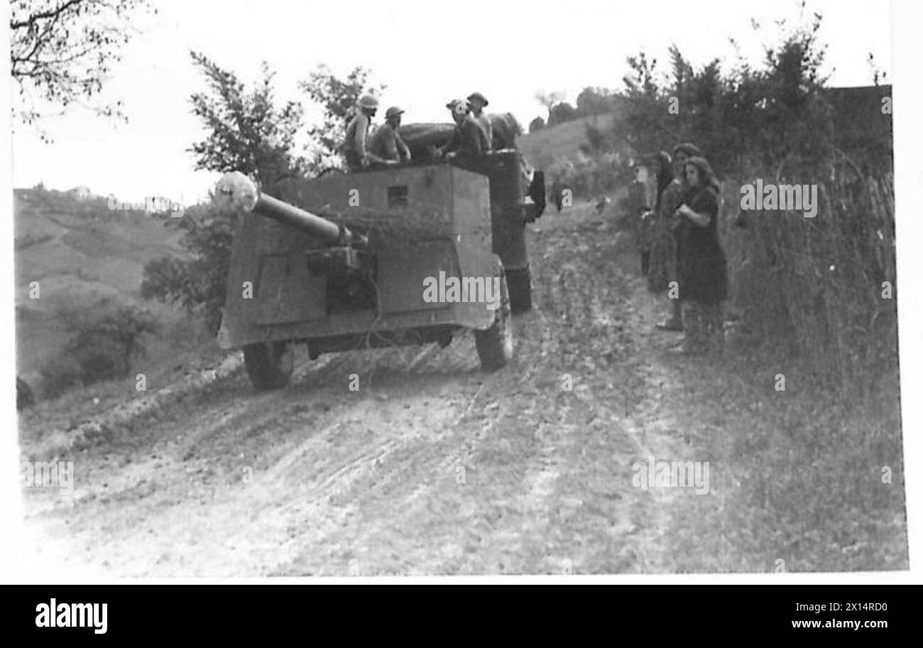 ITALY : EIGHTH ARMY : WITH THE GUNNERS OF AN INDIAN DIVISION - A fal-track draws the 17-pounder along a 'second class' road to the new site , British Army Stock Photo