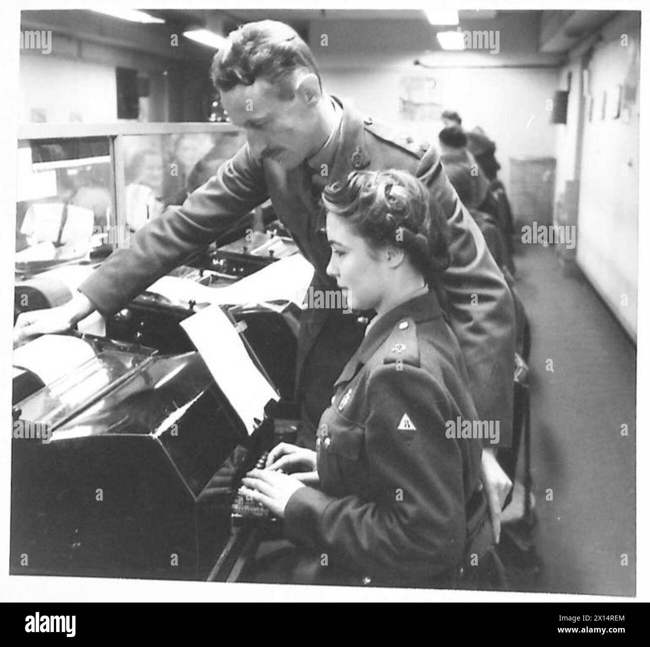 Teletype Operators ATS teleprinter operators are photographed at a London centre ...